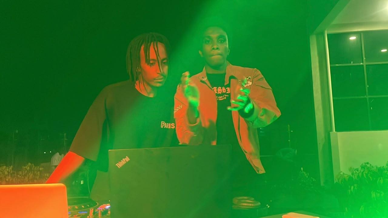 Kibiru Raymond mixing under green stage lights