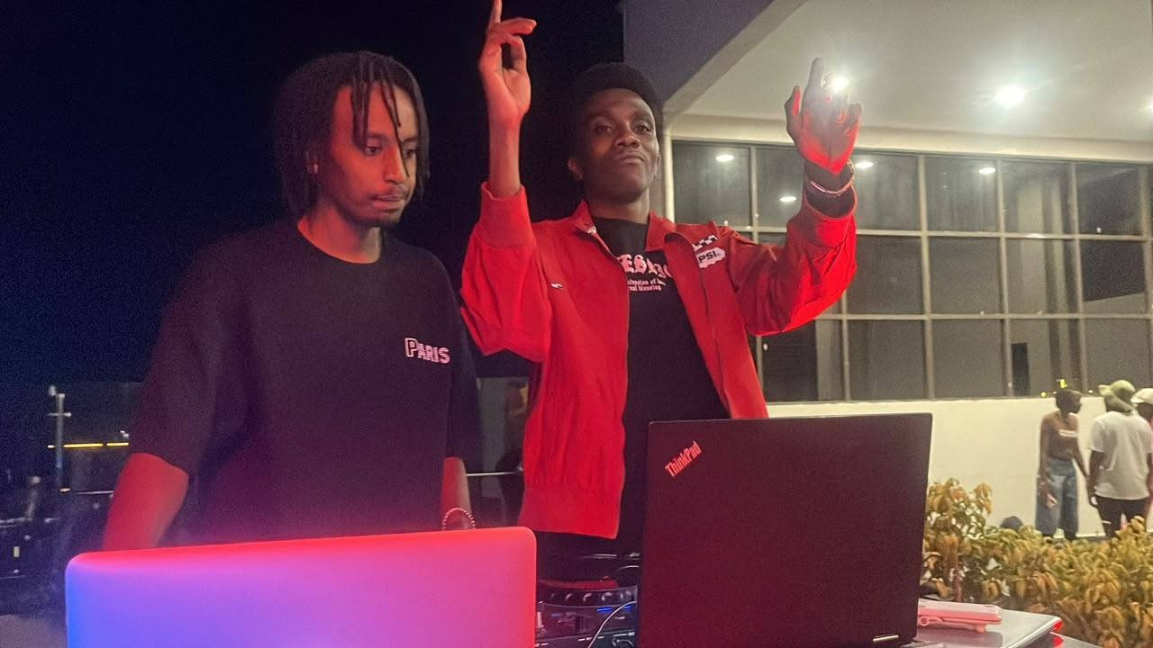 Kibiru Raymond performing on the decks at a Nairobi rooftop
